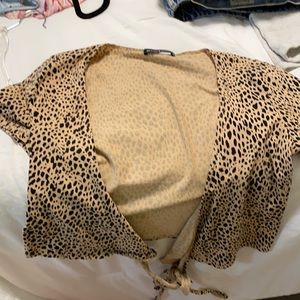 Brandy Melville cheetah tie top